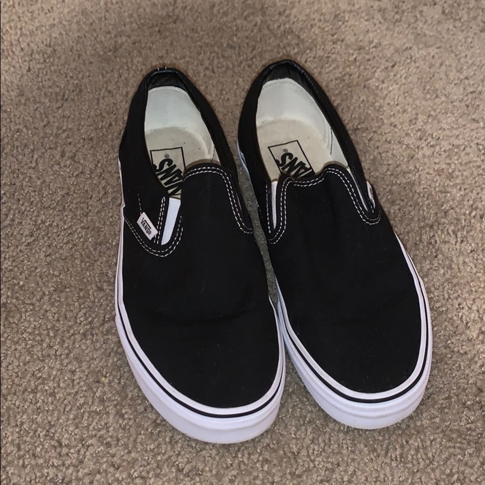 Black and white slip on vans